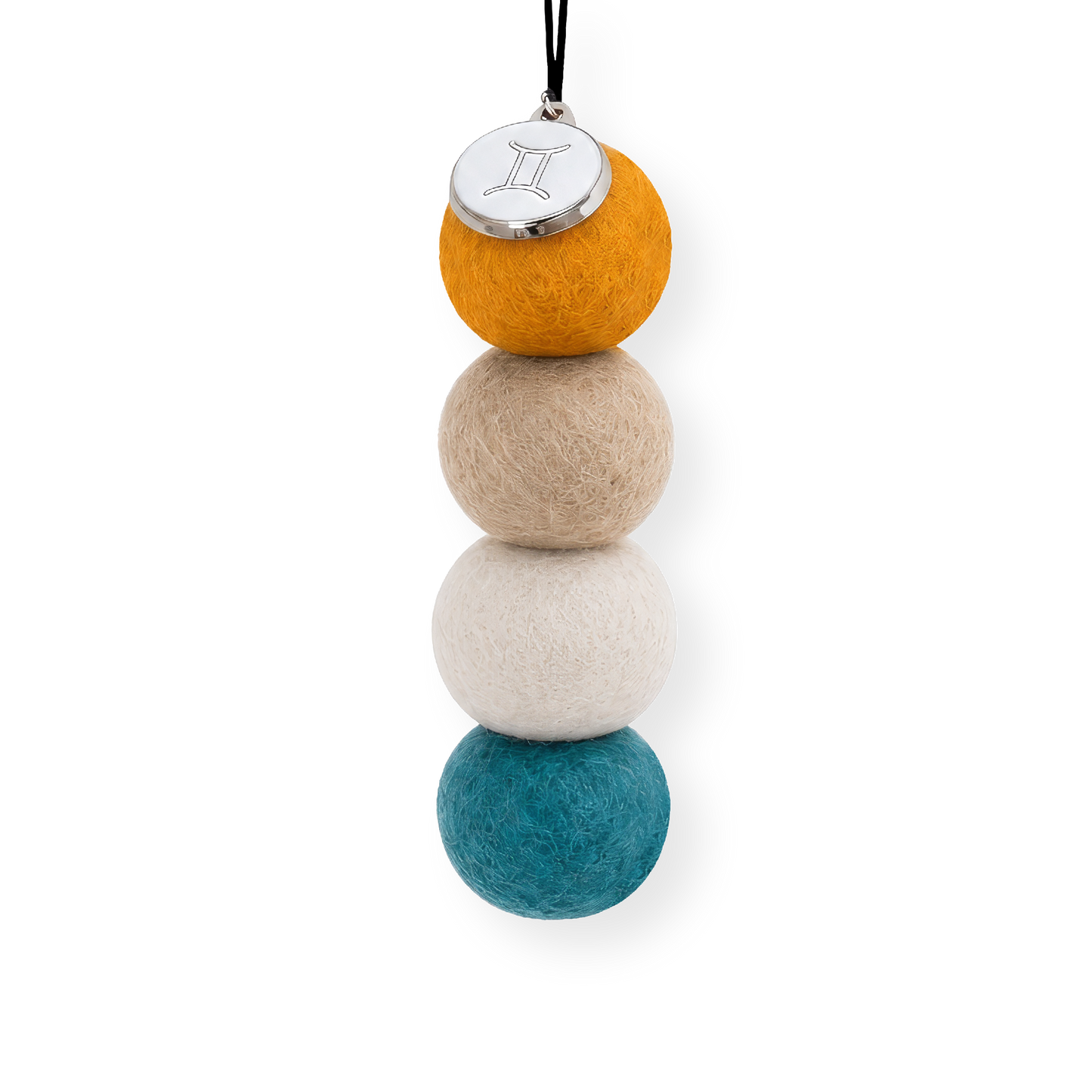 Four reusable wool felt air freshener balls in warm mustard yellow, sandy beige, soft cream, and vibrant teal blue for the Gemini Zodiac Set.