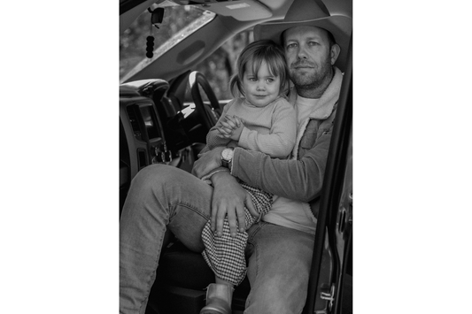 Dad and his daughter with smelly balls in car