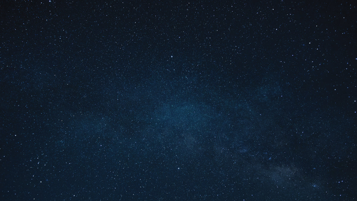 Dark blue starry night sky cosmic background