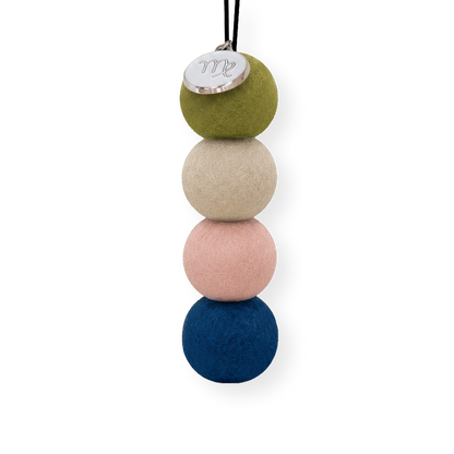 Four reusable wool felt air freshener balls in olive green, warm stone beige, blush pink, and deep navy blue for the Virgo Zodiac Set.