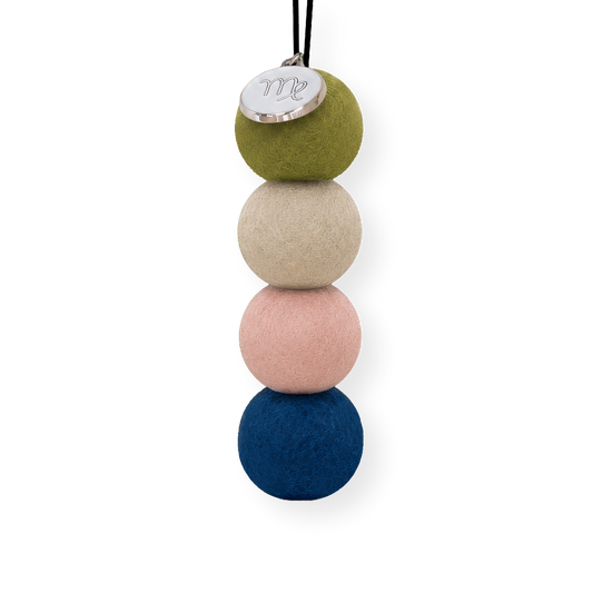 Four reusable wool felt air freshener balls in olive green, warm stone beige, blush pink, and deep navy blue for the Virgo Zodiac Set.